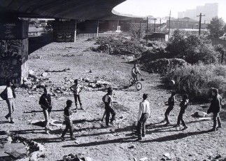 children playing under the Westway circa 70s photo RBKC local studies archive